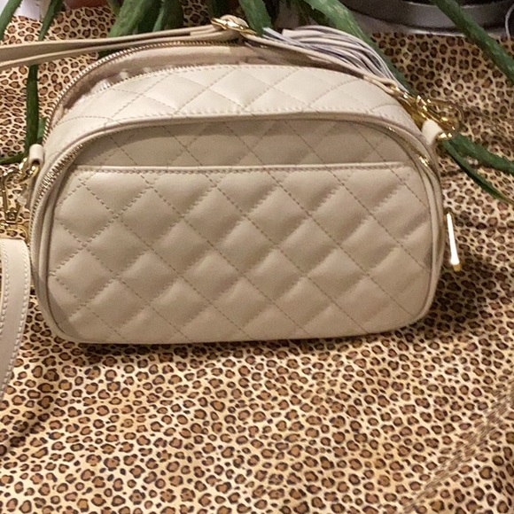 Like new Joy Imani bag trimmed in gold plated zipper attachments and shoulder. - Picture 4 of 13